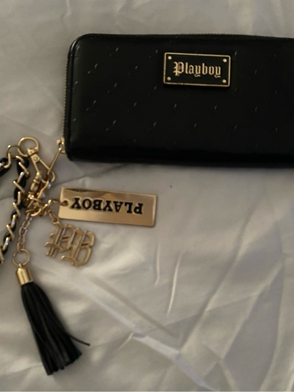 PLAYBOY Black Zip-Around Wallet with Gold Charm Accents
